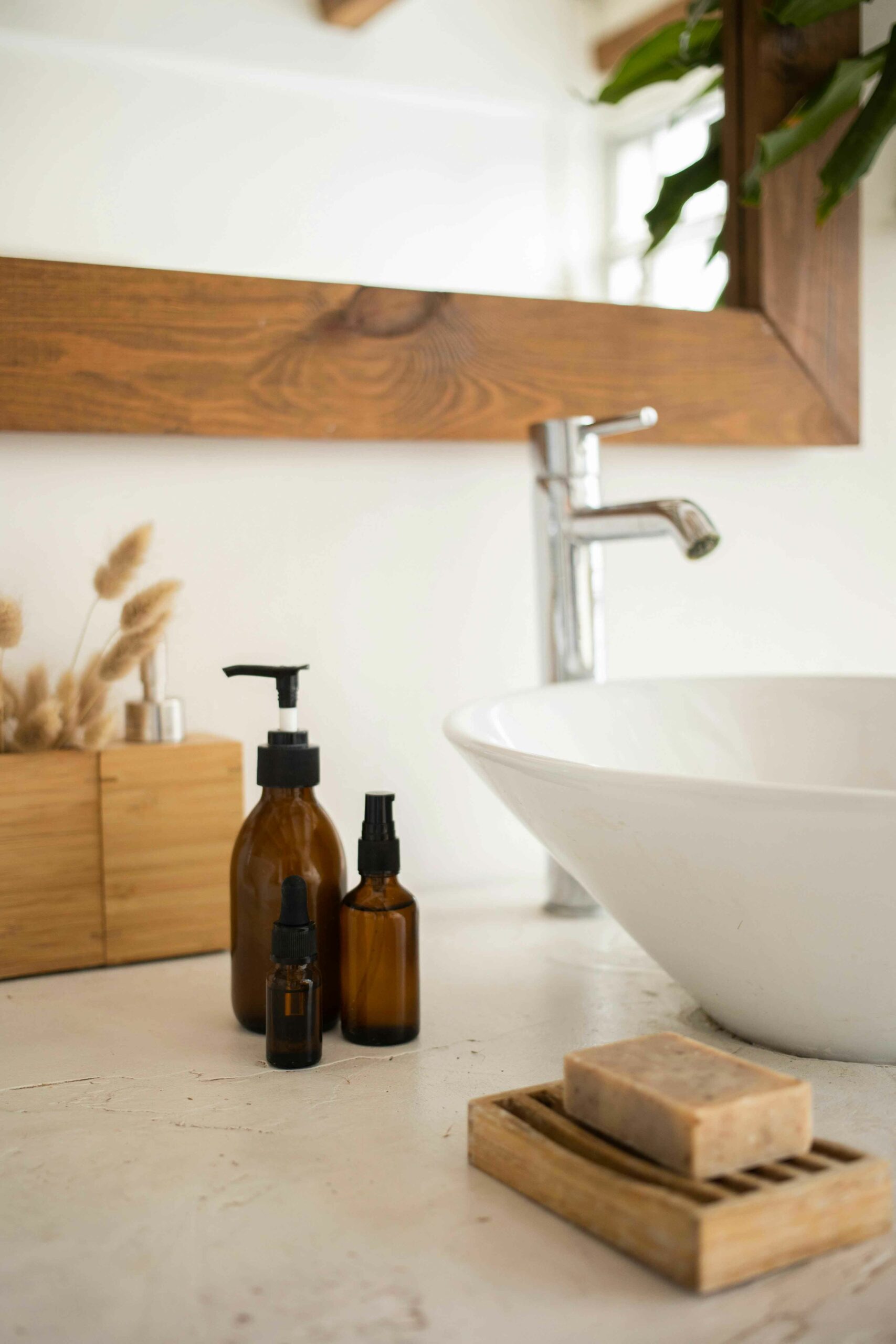 brown bottles near sink